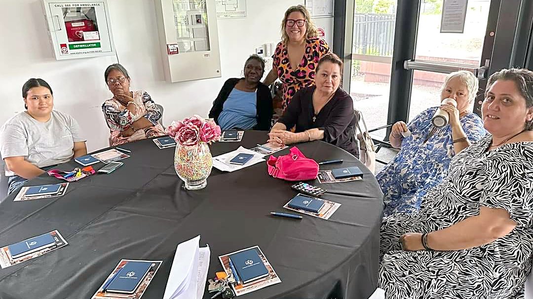 The EPNT team in a planning meeting around the office table