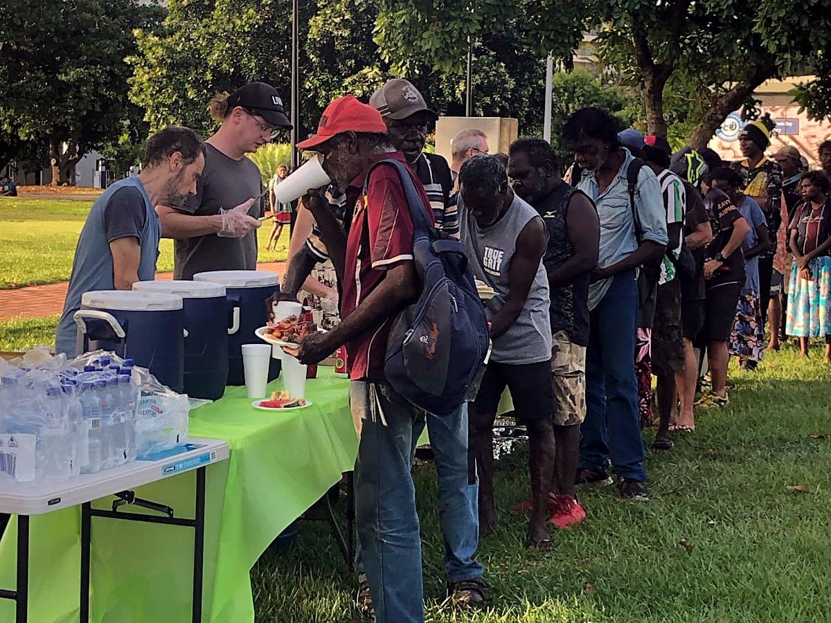 The EPNT community gathering at a Darwin park festival